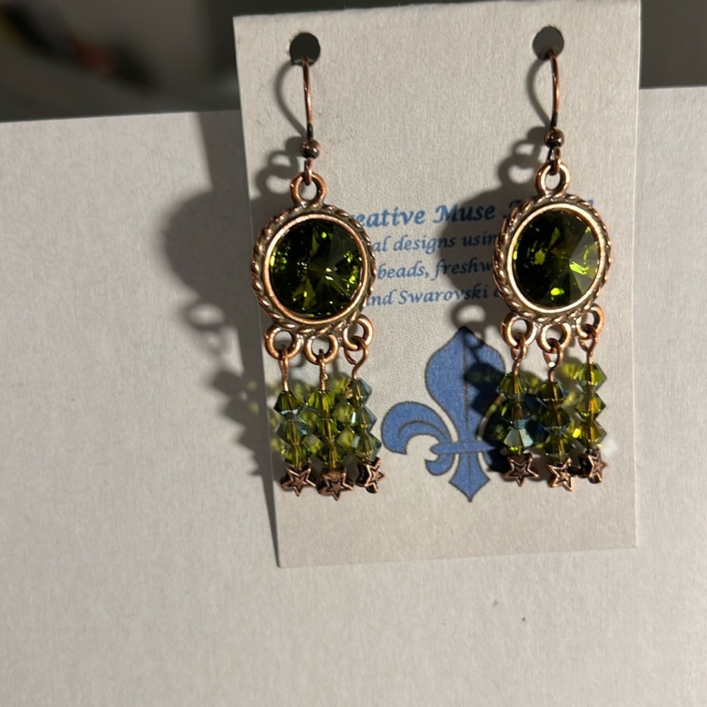 Earrings with Swarovksi Olivine crystal and copper findings with star detail